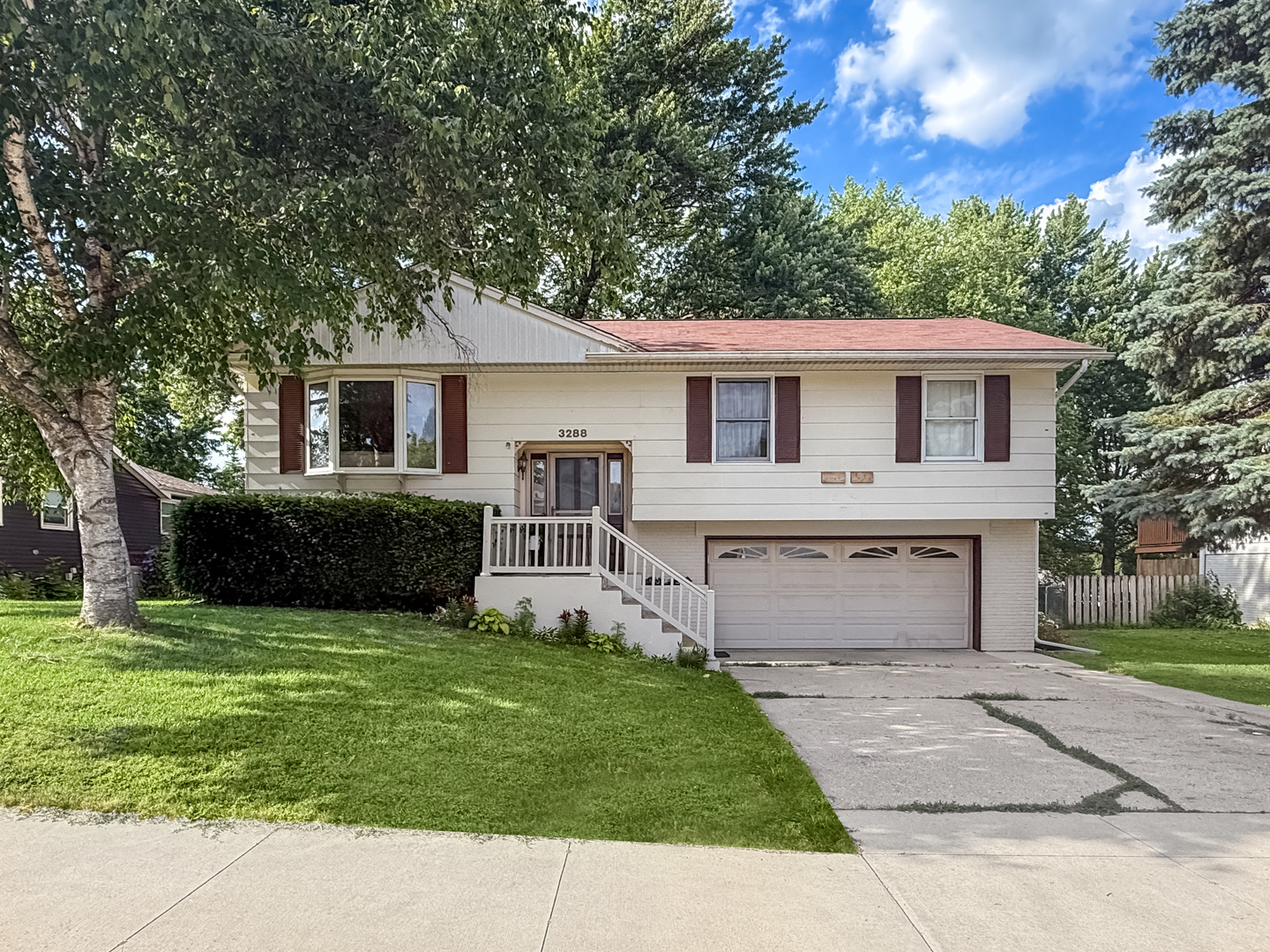 3288 Knox Drive Freeport, IL 61032 - Photo 1 of 41 a front view of house with yard and trees in the background