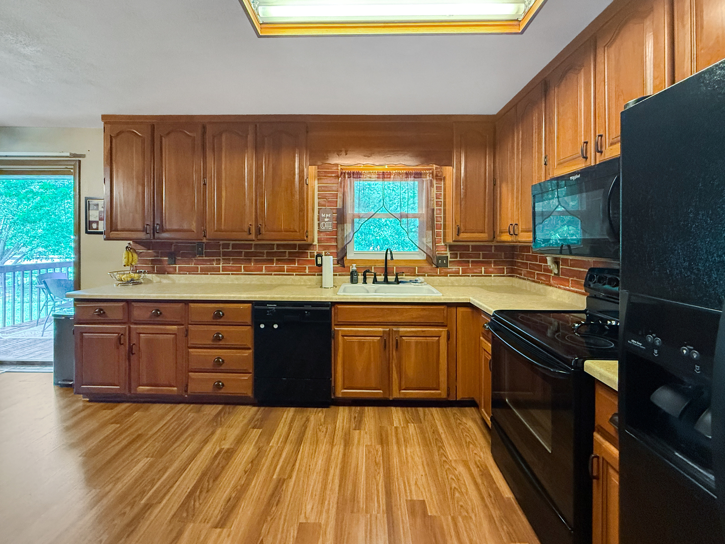 3288 Knox Drive Freeport, IL 61032 - Photo 13 of 41 a kitchen with stainless steel appliances granite countertop a stove a sink dishwasher and a refrigerator