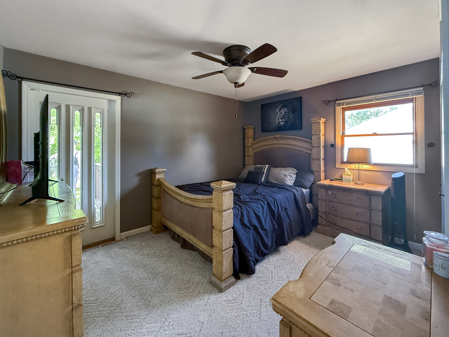3288 Knox Drive Freeport, IL 61032 - Photo 22 of 41 a bedroom with a bed and a chandelier