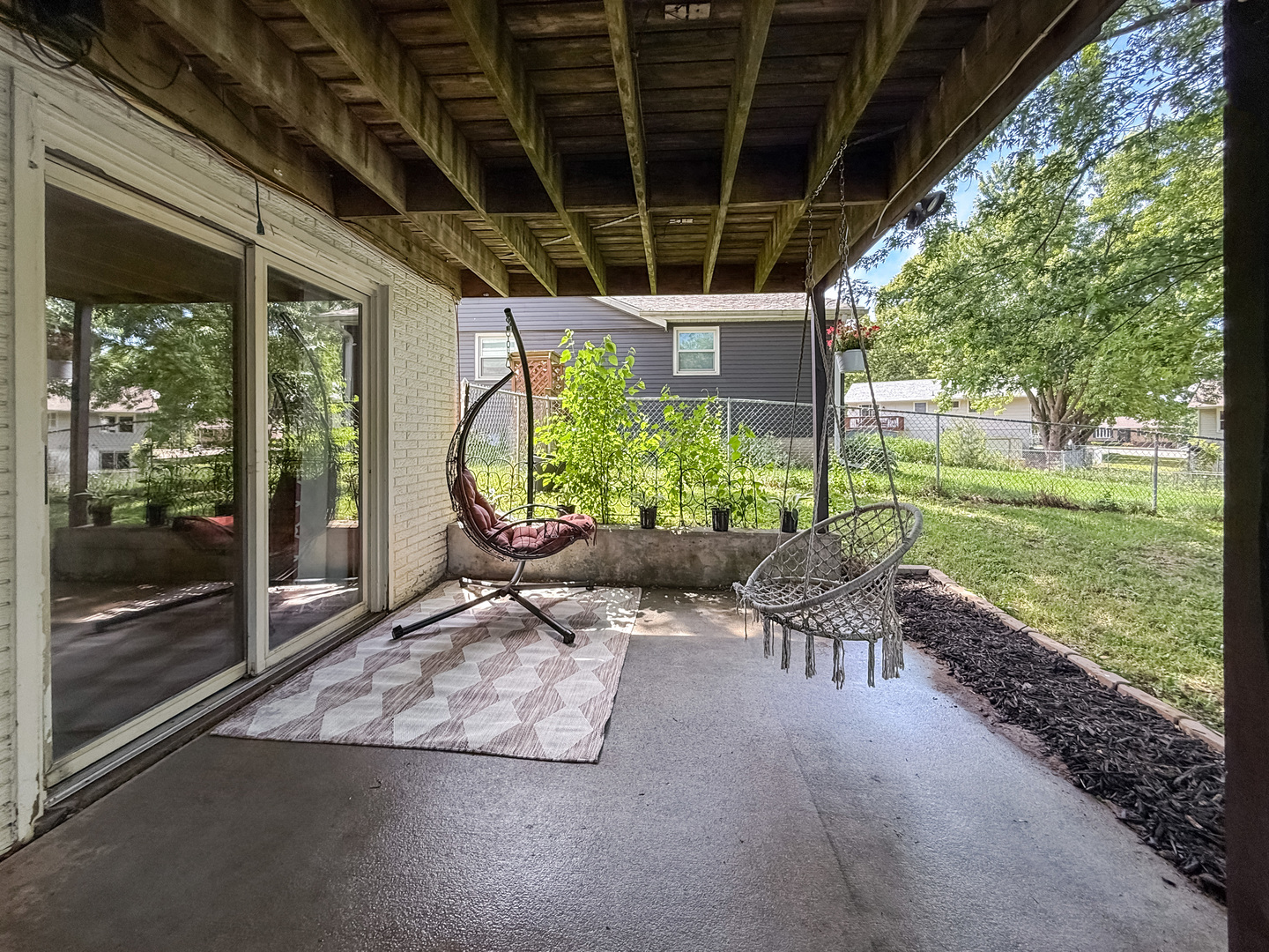 3288 Knox Drive Freeport, IL 61032 - Photo 37 of 41 a view of a porch with furniture and a backyard