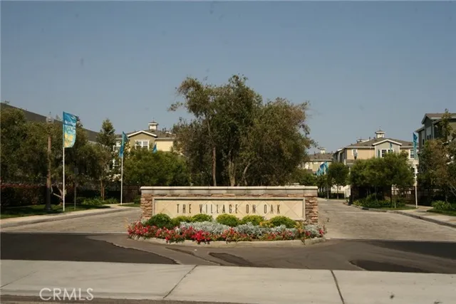 a front view of a building with many windows