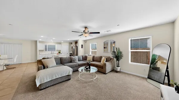 a living room with furniture and a window