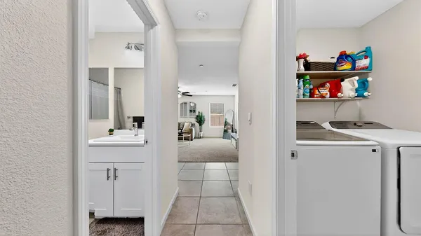 a view of kitchen with furniture and wooden floor