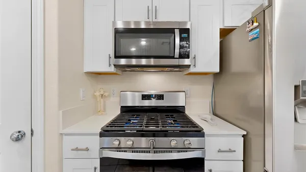 a kitchen with a sink and counter top space
