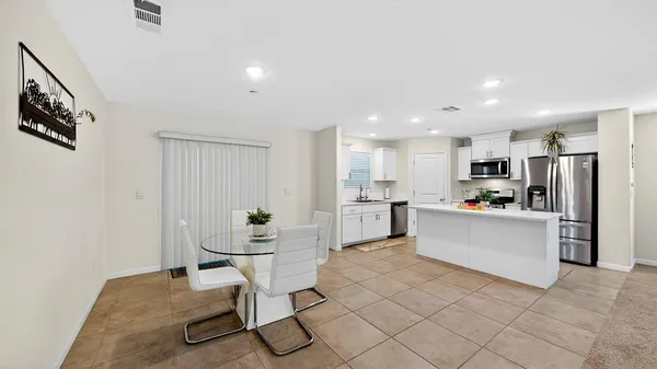 a bed room with a bed and a window