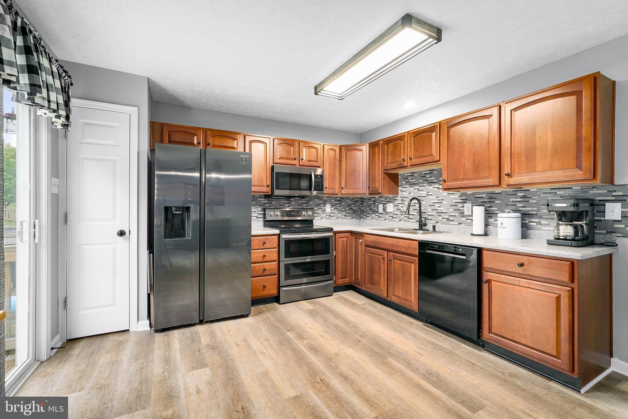 208 Maple Leaf Drive Rising Sun, MD 21911 - Photo 9 of 22 Very large kitchen. All SS appliances included.