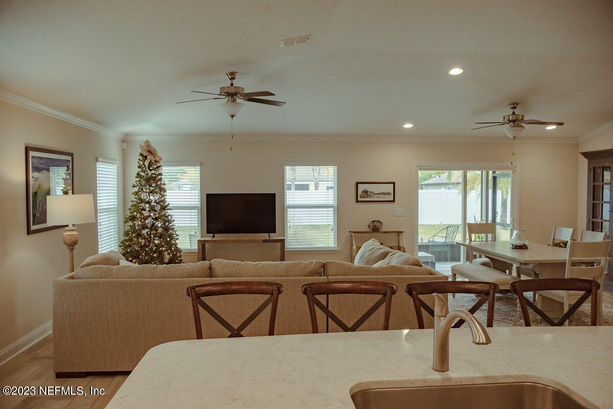 67 Salt Point St. Augustine, FL 32086 - Photo 13 of 39 a living room with furniture and a flat screen tv