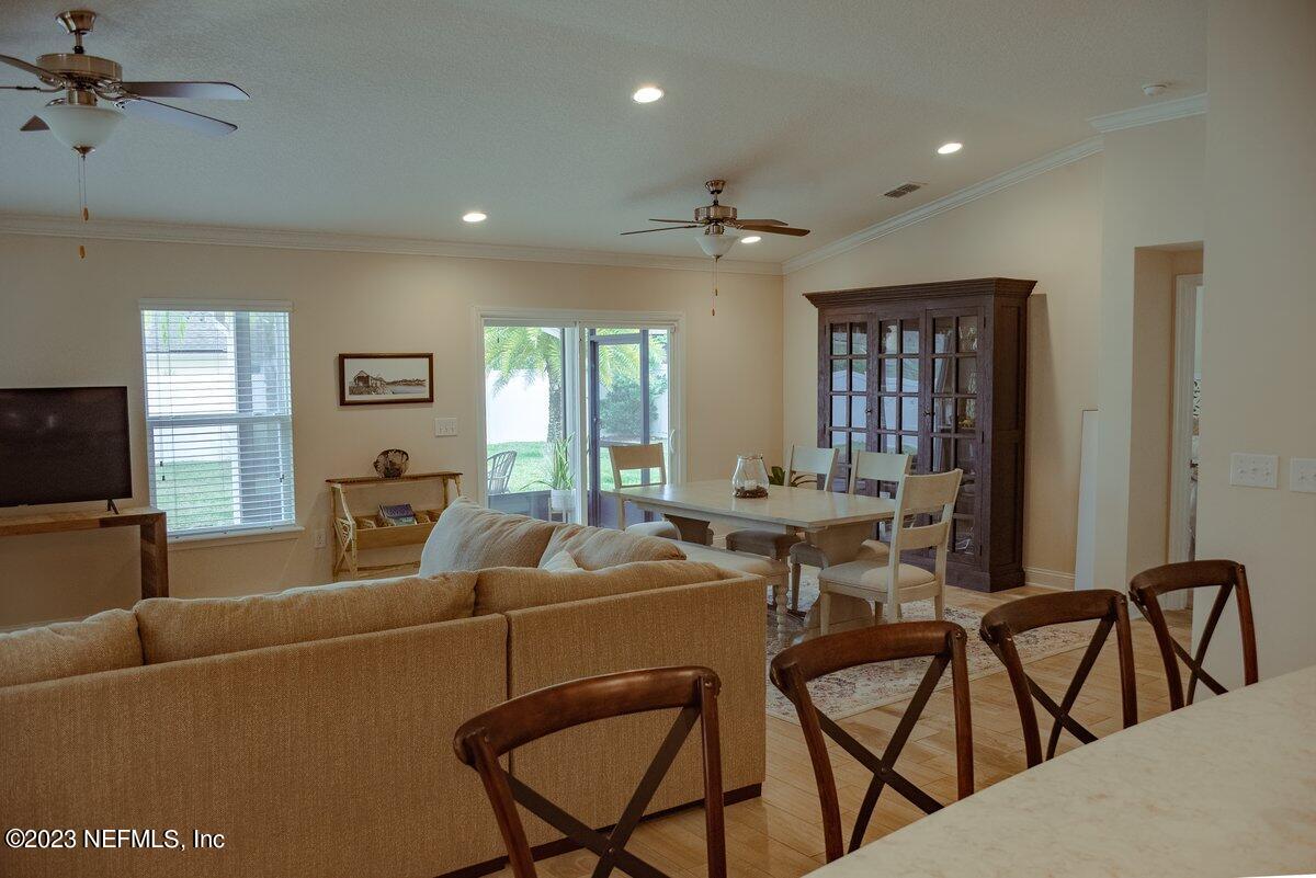 67 Salt Point St. Augustine, FL 32086 - Photo 14 of 39 a living room with furniture a flat screen tv and a window