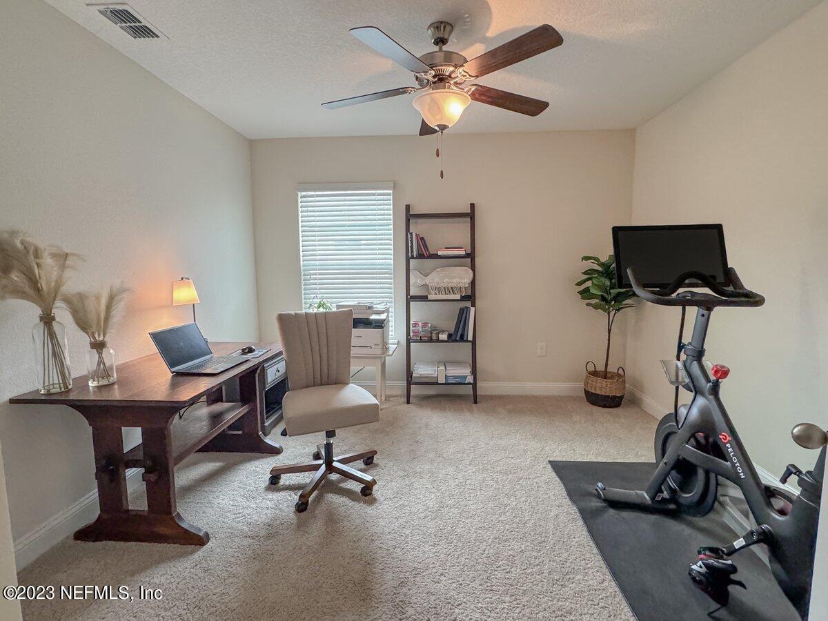 67 Salt Point St. Augustine, FL 32086 - Photo 21 of 39 a view of a workspace with furniture and a window
