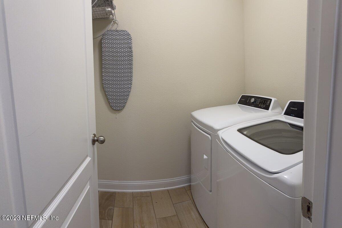 67 Salt Point St. Augustine, FL 32086 - Photo 29 of 39 a utility room with dryer and washer