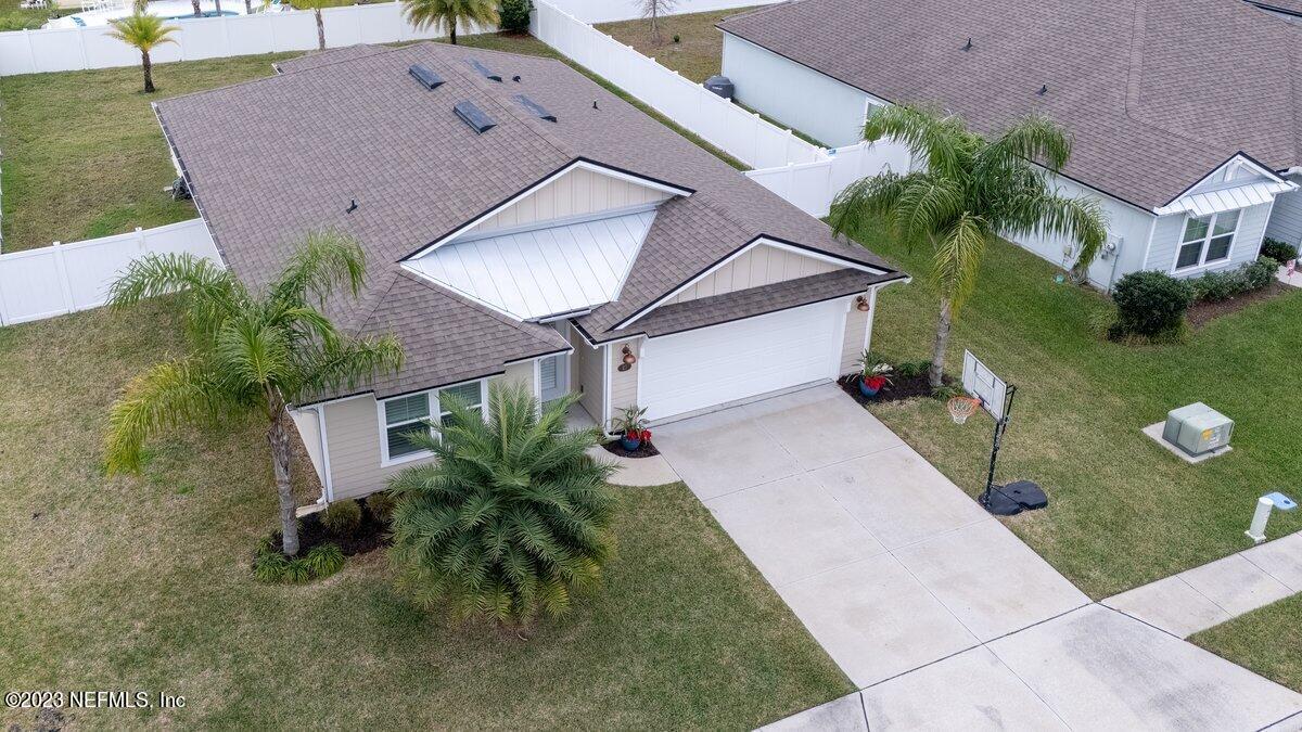 67 Salt Point St. Augustine, FL 32086 - Photo 32 of 39 front view of a house with a yard