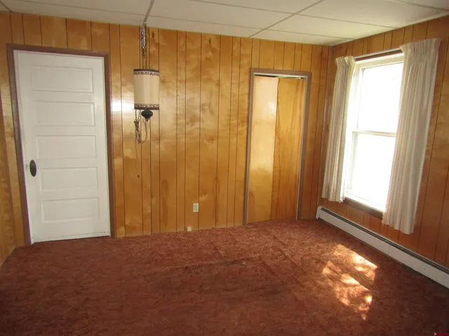 a view of an empty room and window