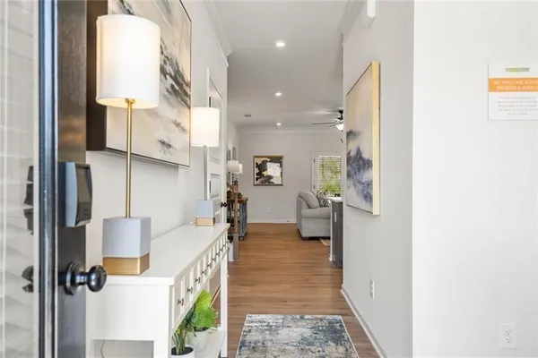 a hallway with a washer and dryer