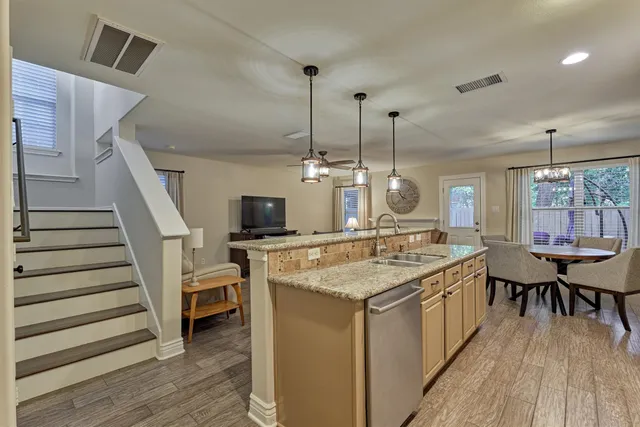 a bathroom with a sink vanity and a mirror