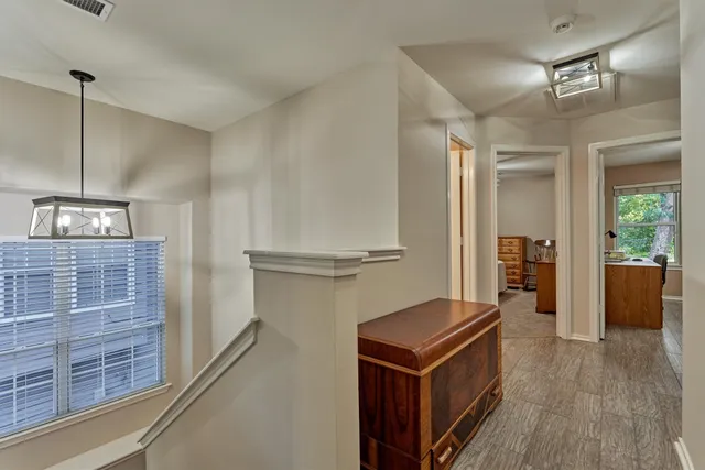 a kitchen with a stove and a refrigerator