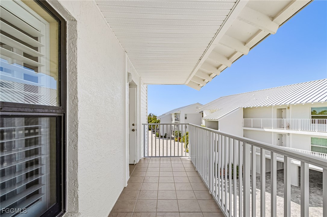 16641 Stringfellow Road, Unit 506 Bokeelia, FL 33922 - Photo 2 of 33 a view of a balcony