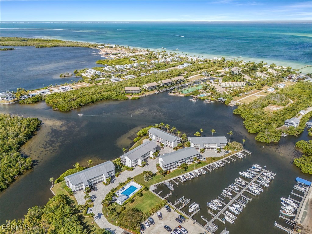 16641 Stringfellow Road, Unit 506 Bokeelia, FL 33922 - Photo 32 of 33 a view of an ocean and beach