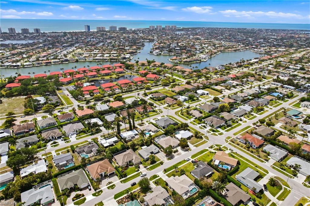 178 Bermuda Road Marco Island, FL 34145 - Photo 2 of 44 Aerial view showcasing the residential area with waterways and gulfront homes.