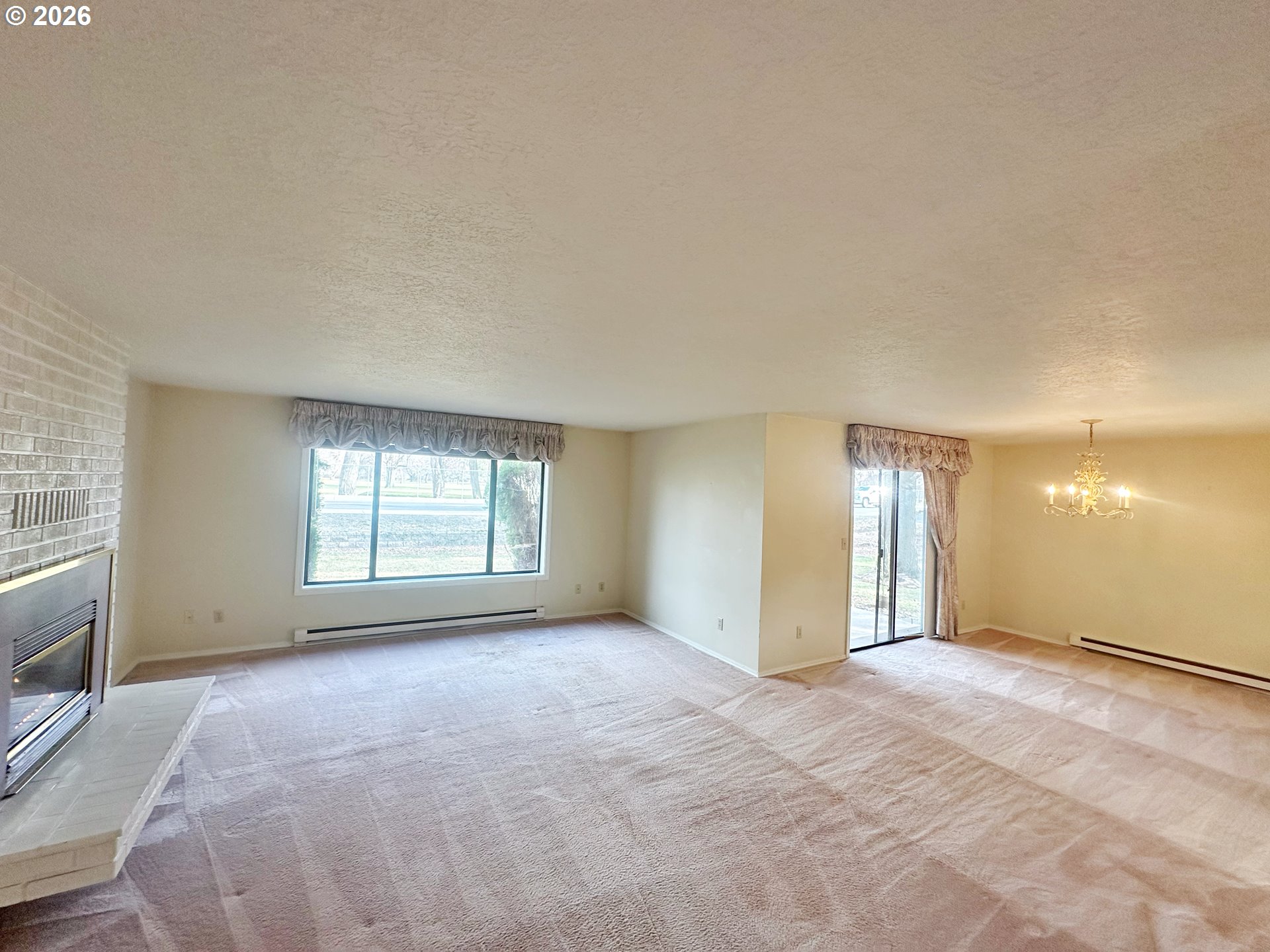 10710 South McAlister Road Island City, OR 97850 - Photo 7 of 22 a view of an empty room with a window