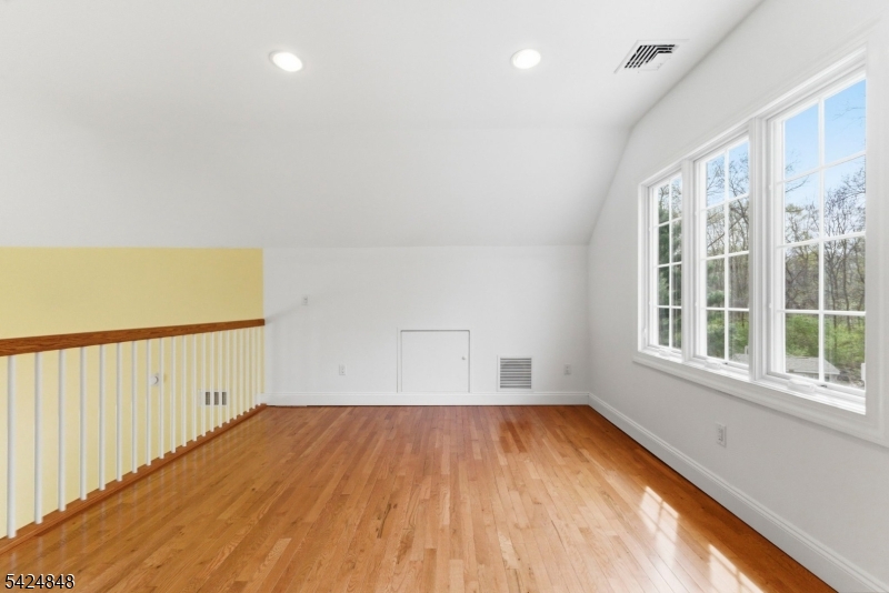 18 Valhalla Road Montville, NJ 07045 - Photo 16 of 33 a view of empty room with wooden floor and fan