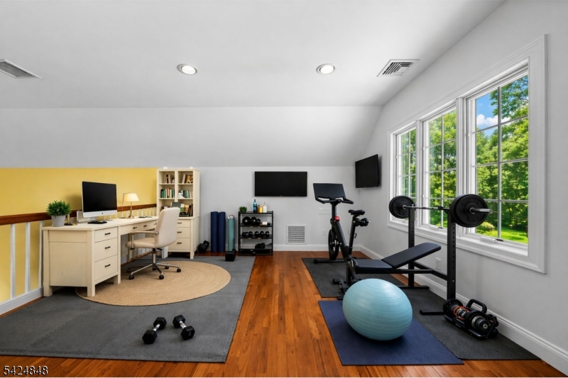 18 Valhalla Road Montville, NJ 07045 - Photo 17 of 33 a room with furniture and a flat screen tv