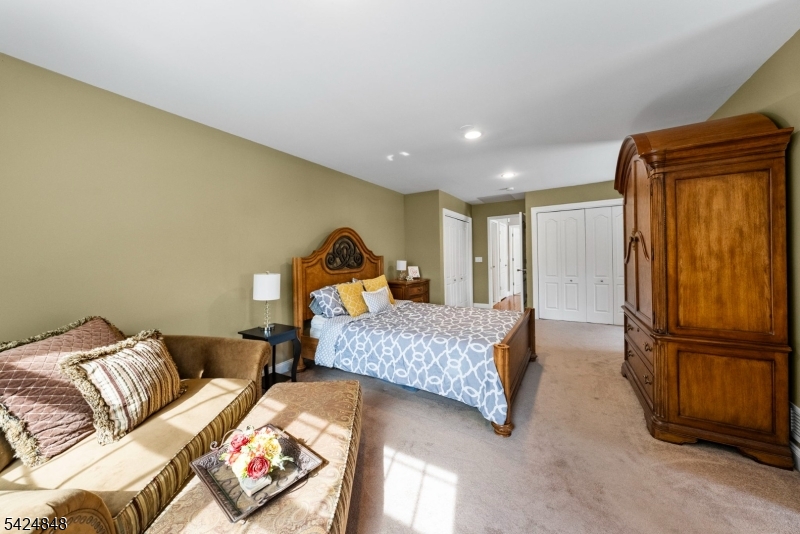 18 Valhalla Road Montville, NJ 07045 - Photo 19 of 33 a bedroom with a bed and wooden floor