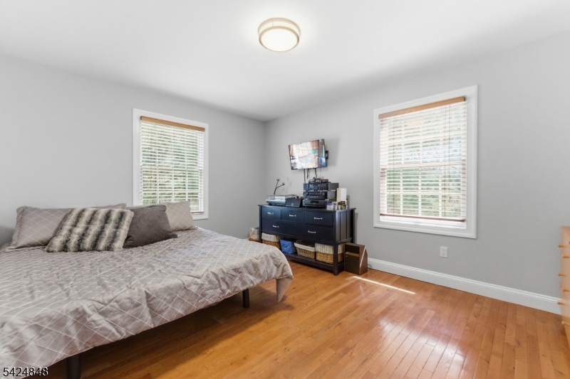 18 Valhalla Road Montville, NJ 07045 - Photo 22 of 33 a bedroom with a bed and a window