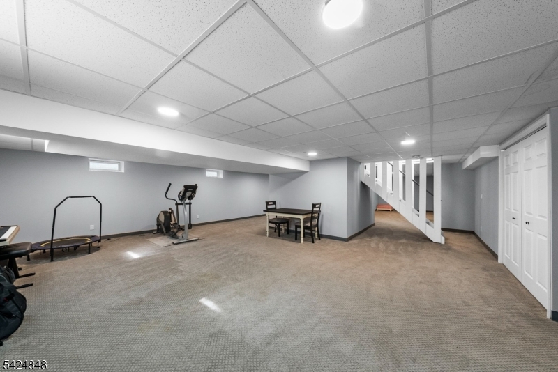 18 Valhalla Road Montville, NJ 07045 - Photo 26 of 33 a view of a room with gym equipment and a large window