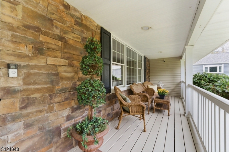 18 Valhalla Road Montville, NJ 07045 - Photo 5 of 33 a balcony with furniture and flowers