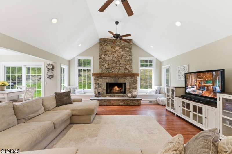 18 Valhalla Road Montville, NJ 07045 - Photo 9 of 33 a living room with furniture and a fireplace