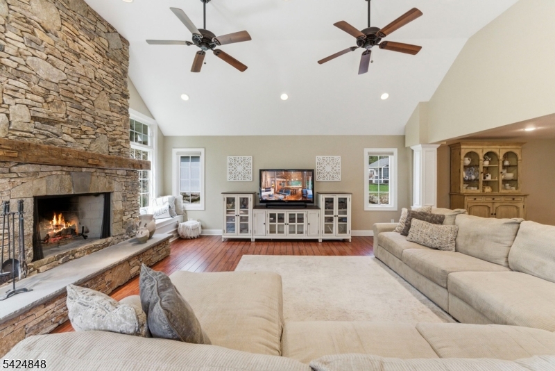 18 Valhalla Road Montville, NJ 07045 - Photo 10 of 33 a living room with furniture and a fireplace
