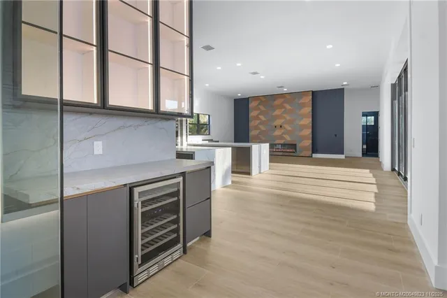 a swimming pool with outdoor seating and yard