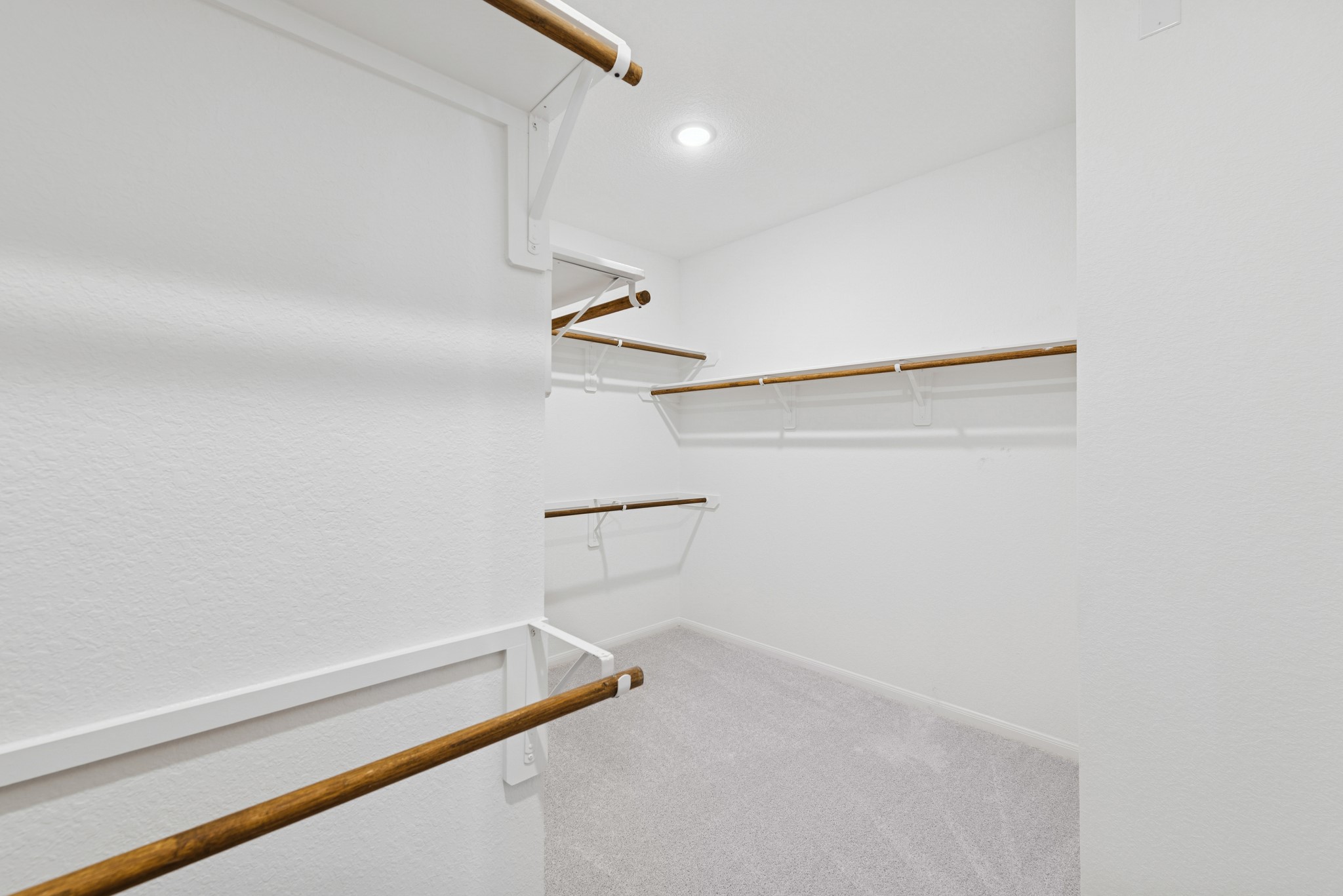 32402 Mimosa Ridge Lane Waller, TX 77484 - Photo 16 of 32 Walk-in closet in the owner's suite