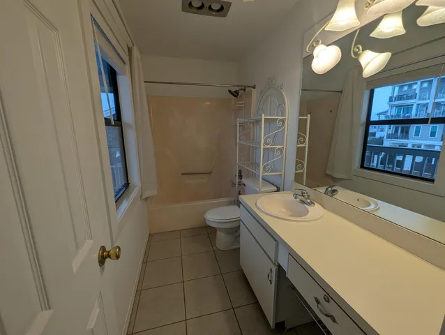 an aerial view of a house having patio