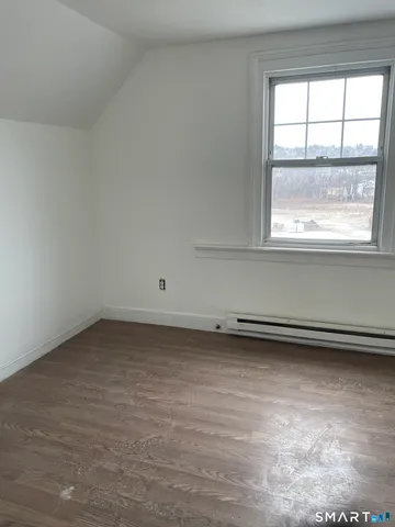 a view of a window in an empty room