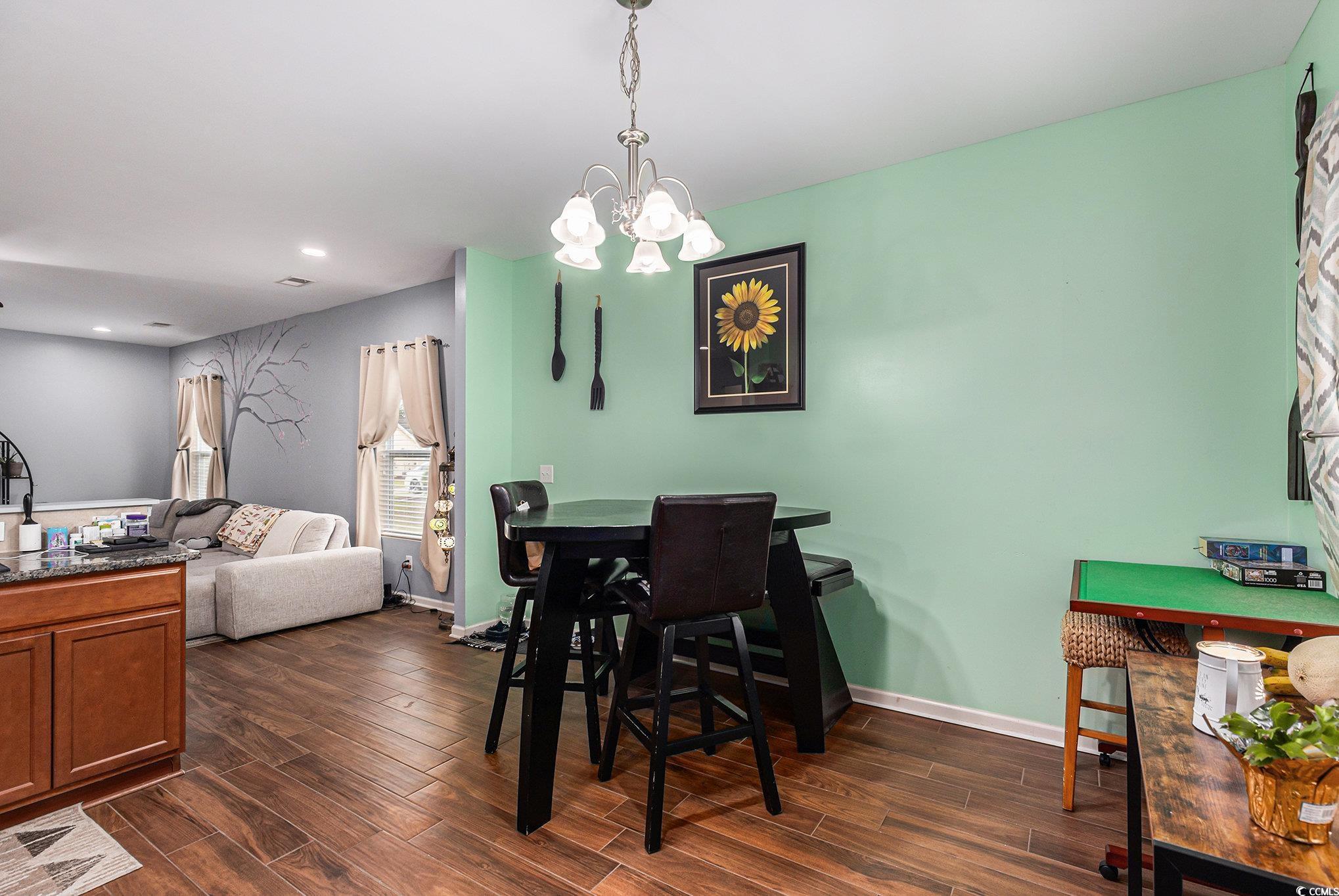 436 Cotton Grass Drive Loris, SC 29569 - Photo 11 of 33 Dining area featuring dark wood-type flooring, a chandelier, recessed lighting, and baseboards