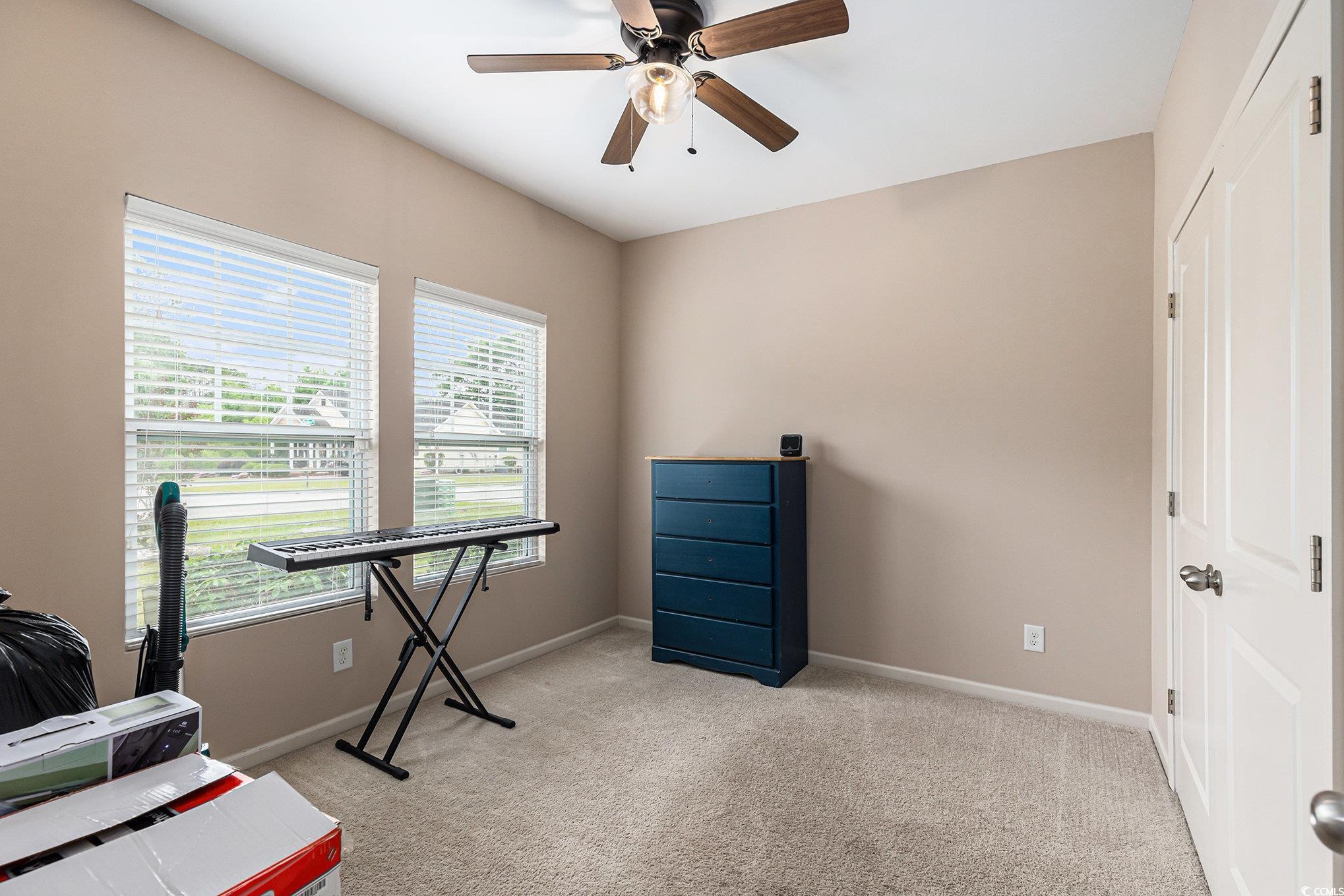 436 Cotton Grass Drive Loris, SC 29569 - Photo 17 of 33 Office area featuring light colored carpet, a ceiling fan, and baseboards