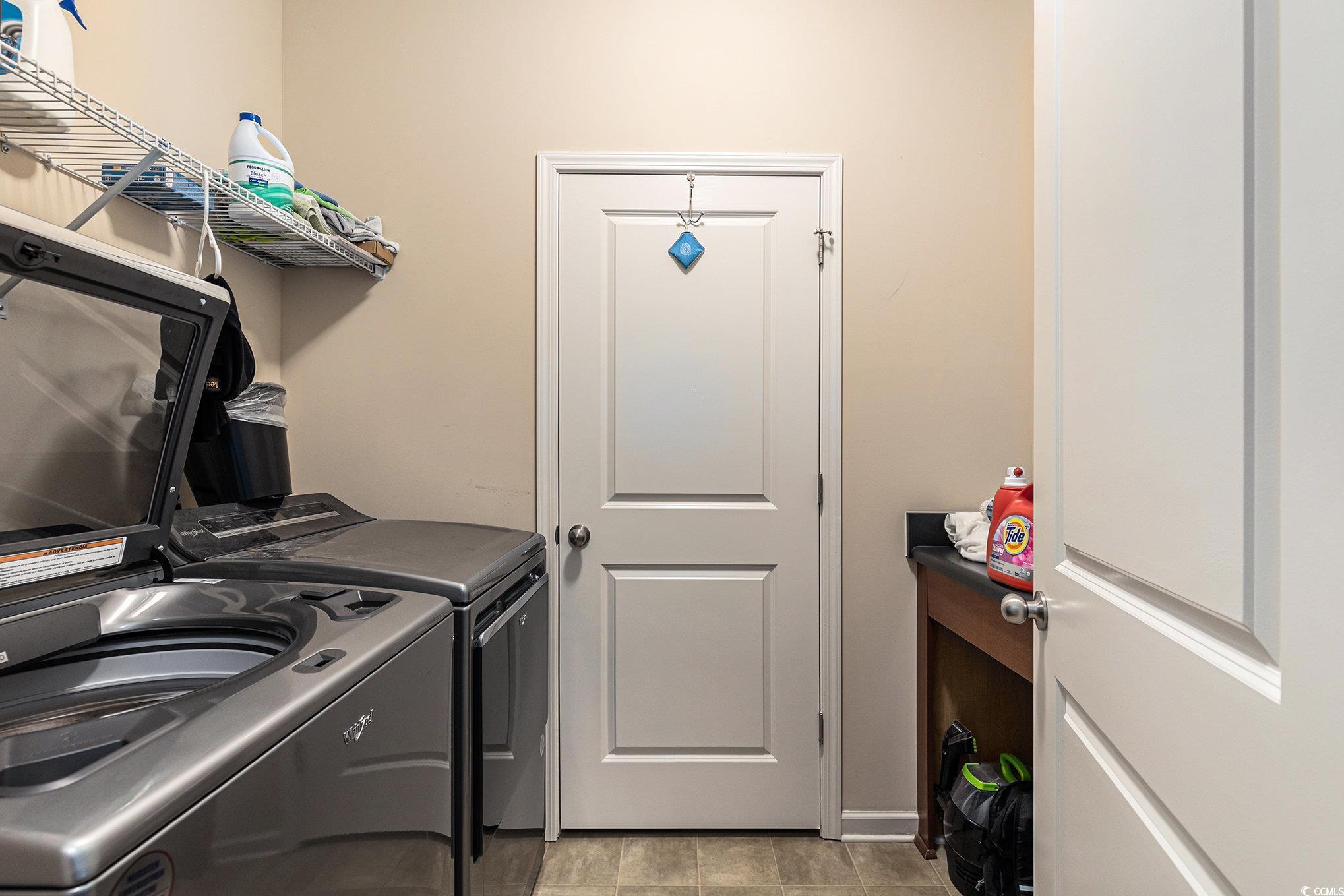 436 Cotton Grass Drive Loris, SC 29569 - Photo 25 of 33 Laundry room with washing machine and clothes dryer