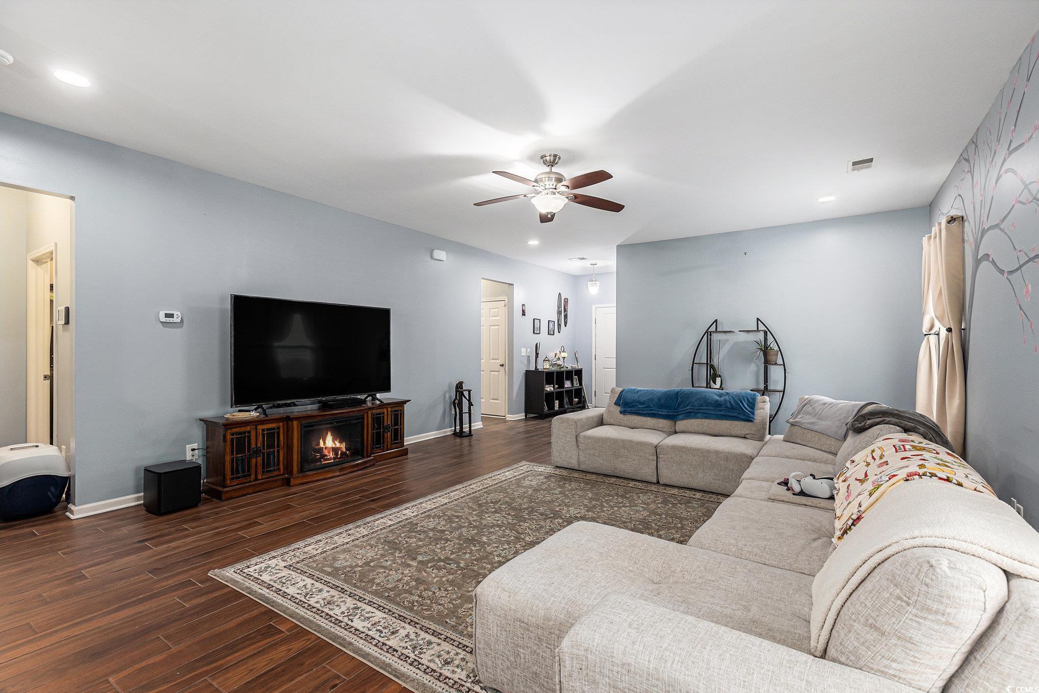 436 Cotton Grass Drive Loris, SC 29569 - Photo 4 of 33 Living room featuring a ceiling fan, dark wood-style flooring, recessed lighting, and baseboards