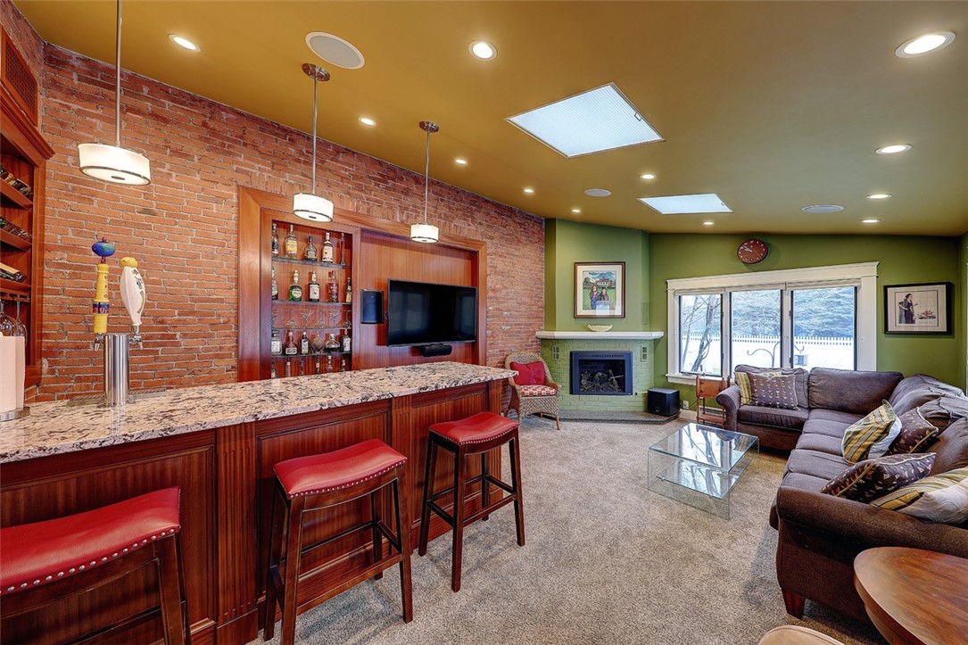 441 Rochambeau Avenue Providence, RI 02906 - Photo 20 of 50 Family room with gas fireplace and bar, surround sound