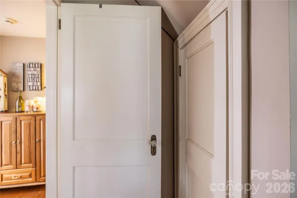 a view of staircase with lots of white walls