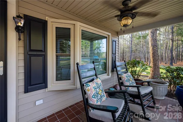 a outdoor living space with patio furniture and a potted plant