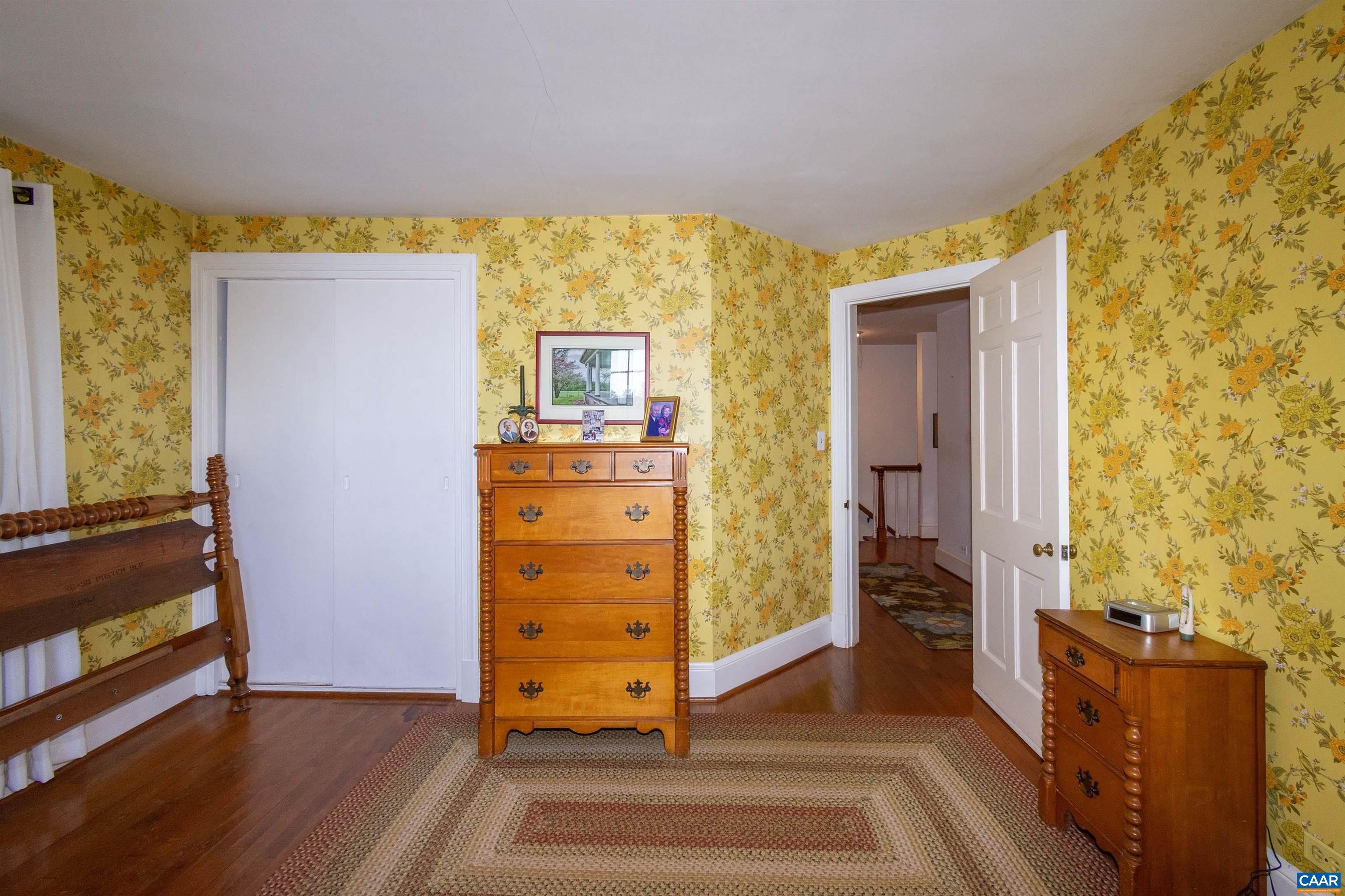 358 East Main Street Orange, VA 22960 - Photo 22 of 56 a view of a hallway with closet and wooden floor