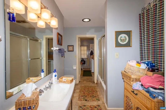 a kitchen with stainless steel appliances granite countertop a stove top oven