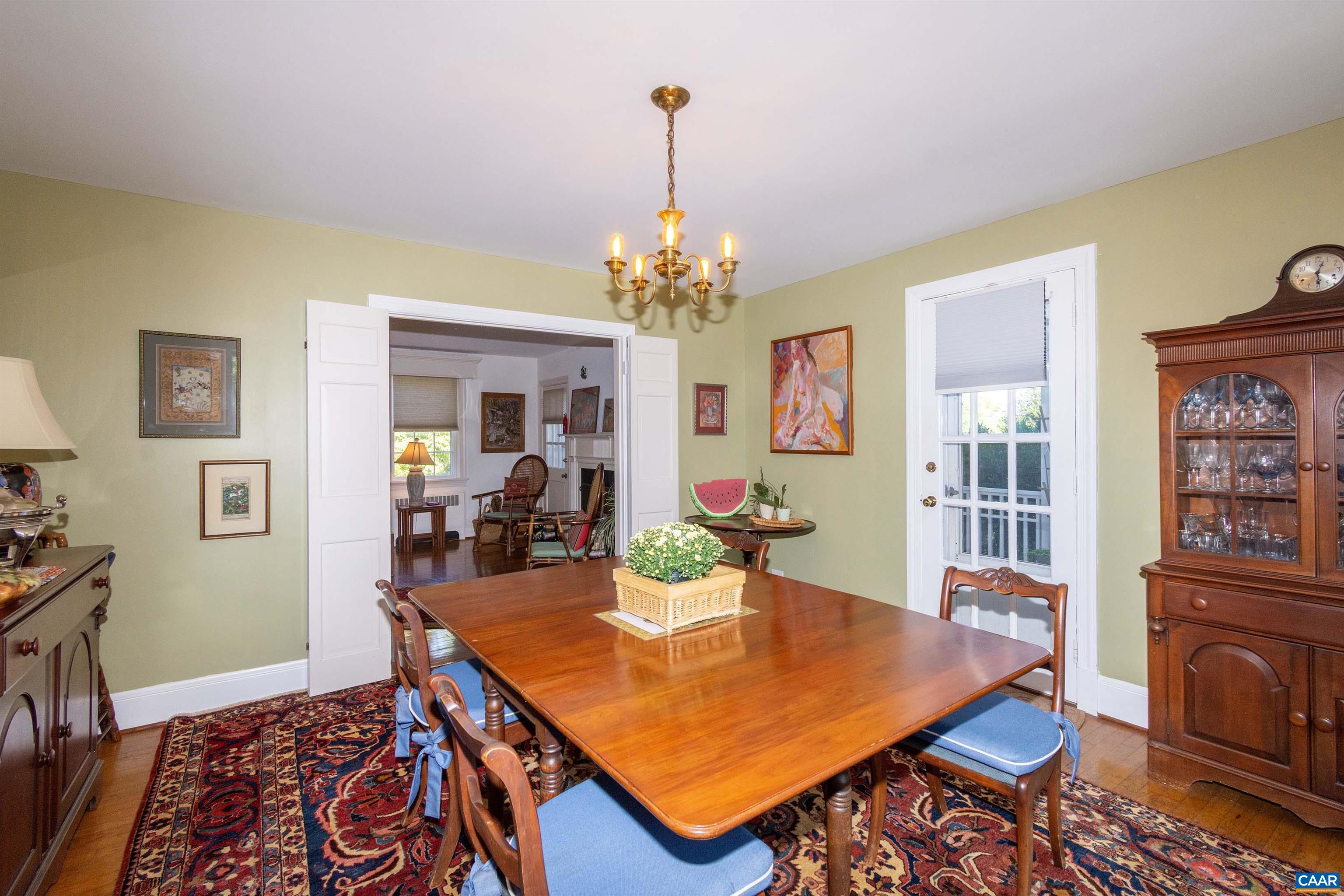 358 East Main Street Orange, VA 22960 - Photo 50 of 56 a dining room with a table and chairs