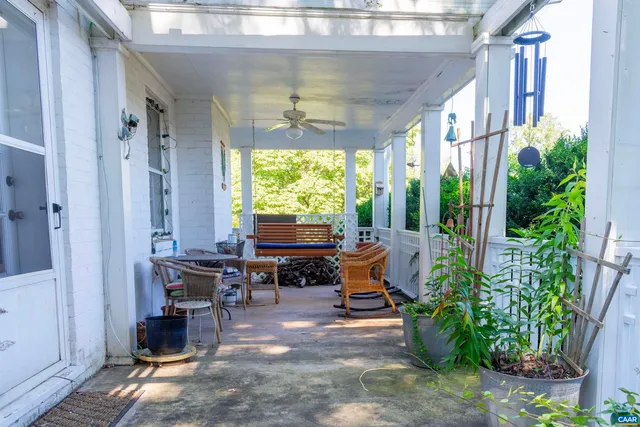 a view of swimming pool with a yard