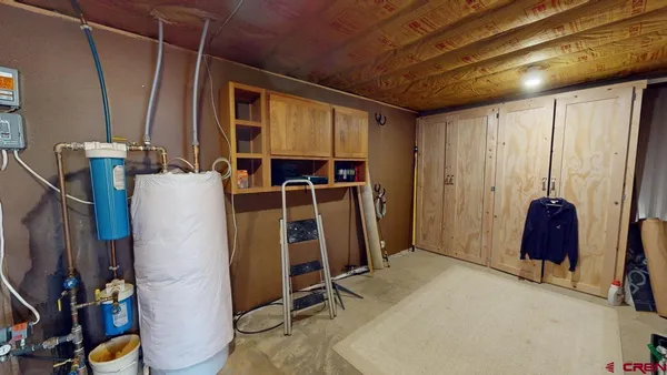 a bathroom with a toilet and a sink
