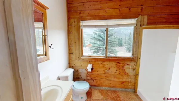 a view of front door with wooden floor