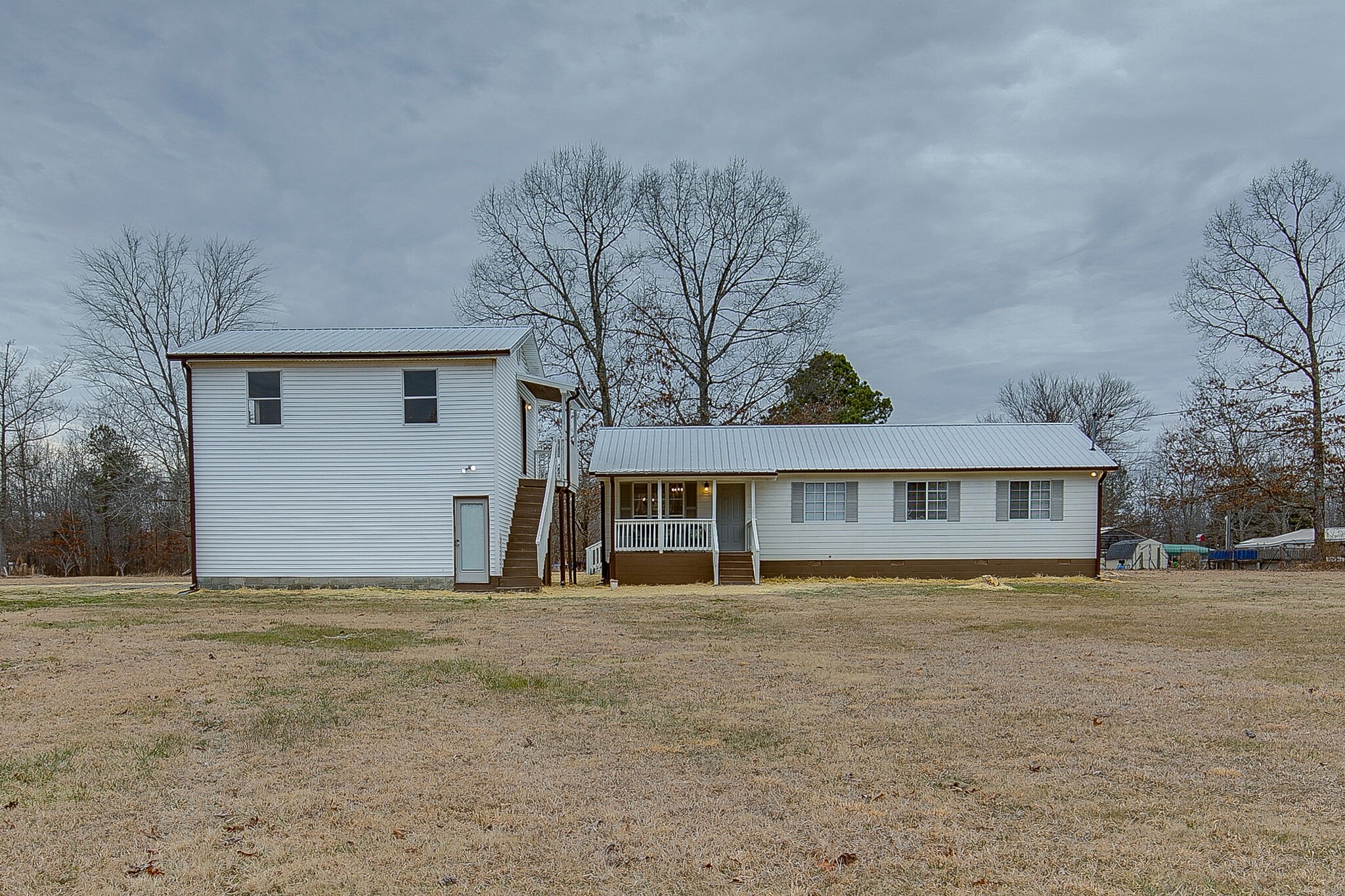 331 Alice Boynton Road Manchester, TN 37355 - Photo 2 of 22 a front view of a house with a yard