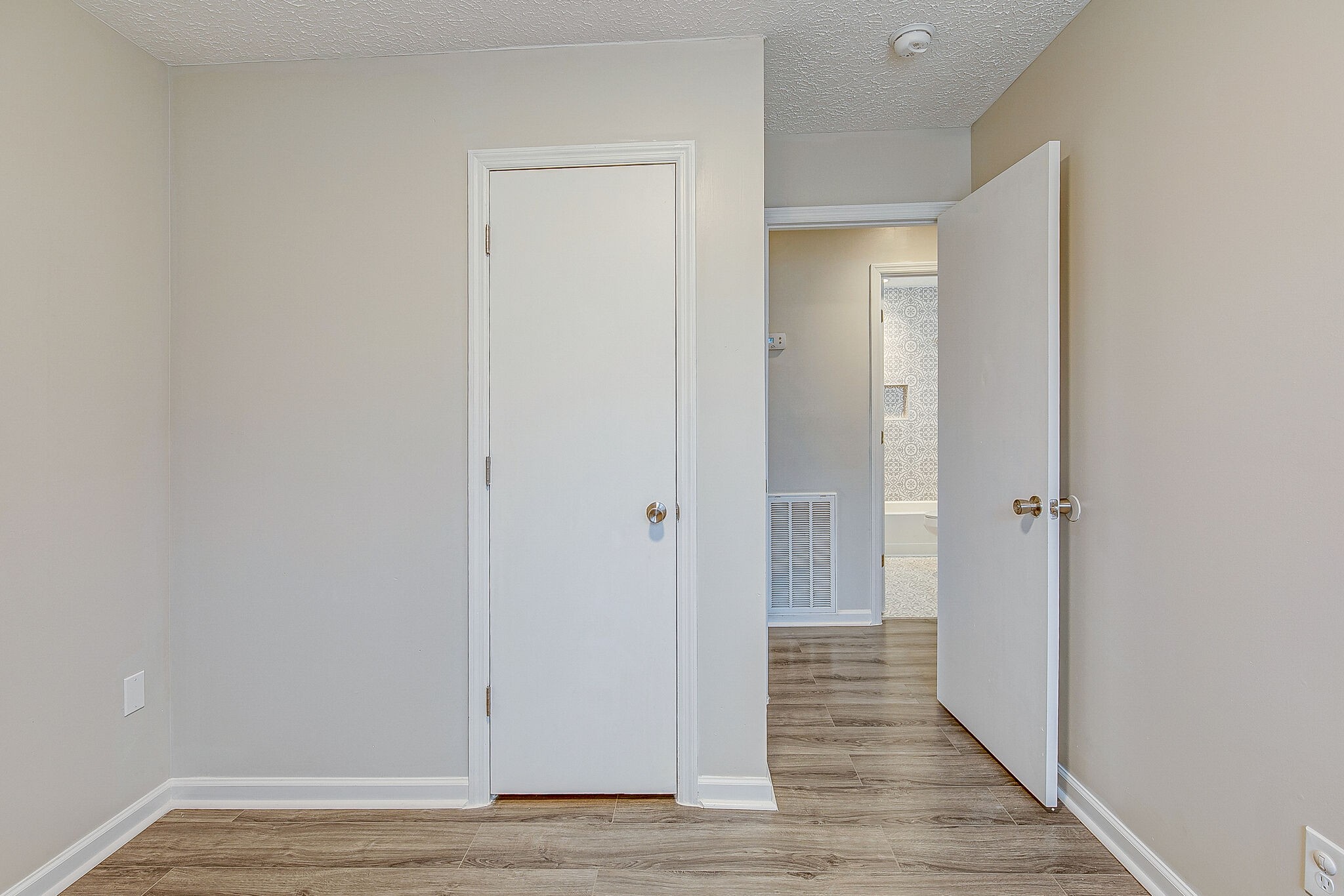 331 Alice Boynton Road Manchester, TN 37355 - Photo 12 of 22 a view of a hallway with wooden floor